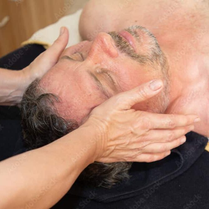 AdobeStock_543800445_Preview head massage mature man